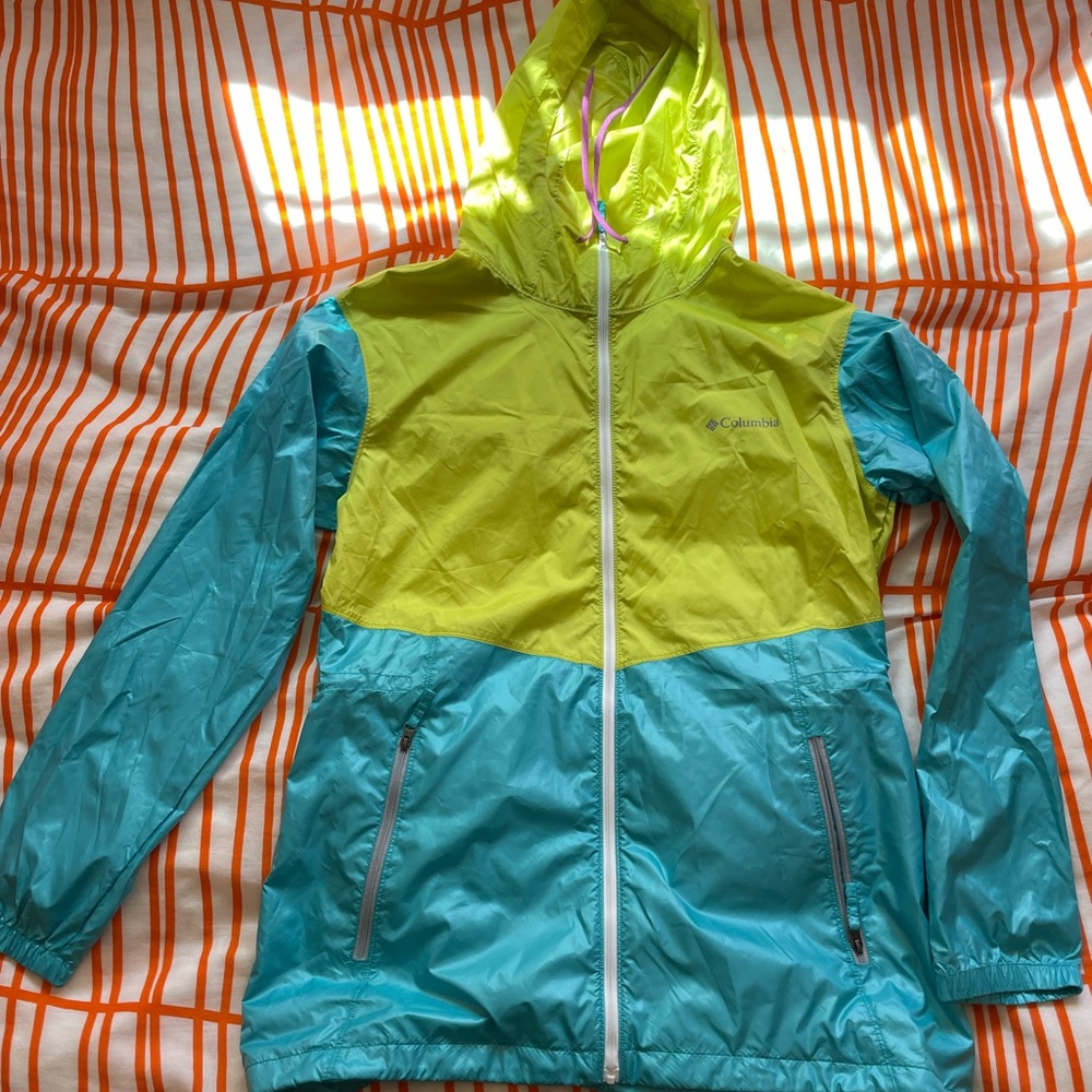 New Columbia light jacket. Green blue with lunch strings size medium